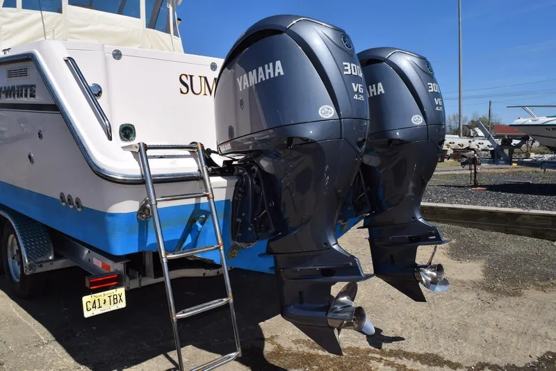 Slide: The Image of 2013 Grady-White Express 330 boat with twin Yamaha 300 V6 engines. - 31