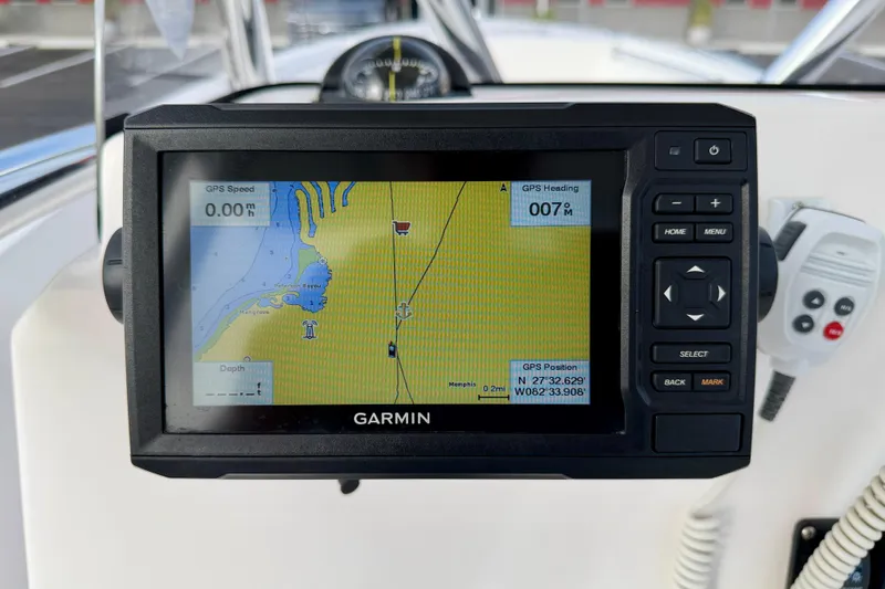 Slide: The Image of Garmin GPS display on 2023 Aquasport 220 CC boat dashboard. - 21