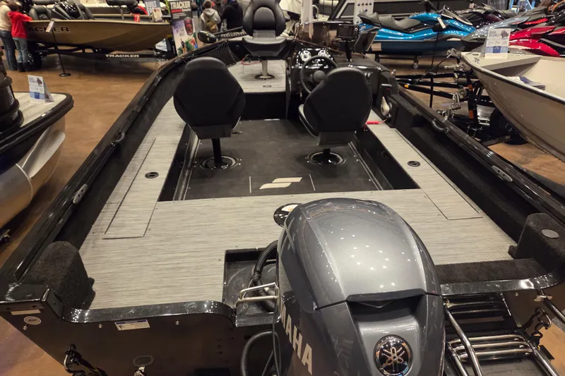 Slide: The Image of 2026 Starcraft Starfire 160 SC boat with Yamaha motor, displayed indoors. - 4