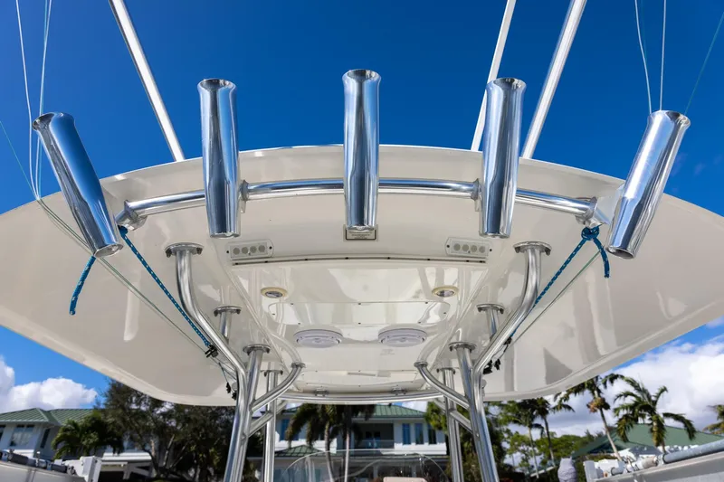 Slide: The Image of 2014 Regulator 25 boat deck with dual Yamaha engines on water. - 19