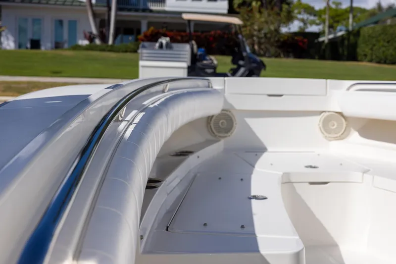 Slide: The Image of Control panel of a 2014 Regulator 25 boat with Garmin navigation systems. - 21