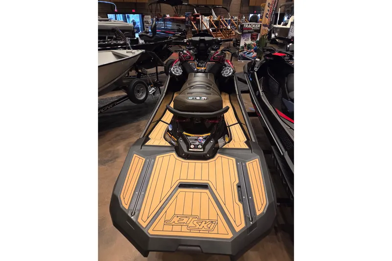 Slide: The Image of 2026 Kawasaki Ultra 310LX jet ski on display in showroom setting. - 3