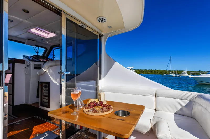 Slide: The Image of Luxurious yacht interior with wine and charcuterie, NNS Sea Scout 41, 2007 model, ocean view. - 10