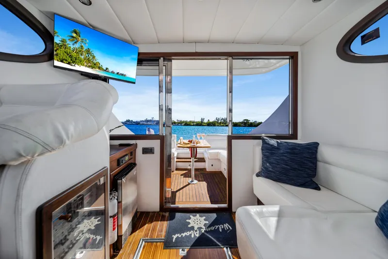 Slide: The Image of Luxurious interior of 2007 Custom NNS Sea Scout 41 yacht with ocean view. - 14