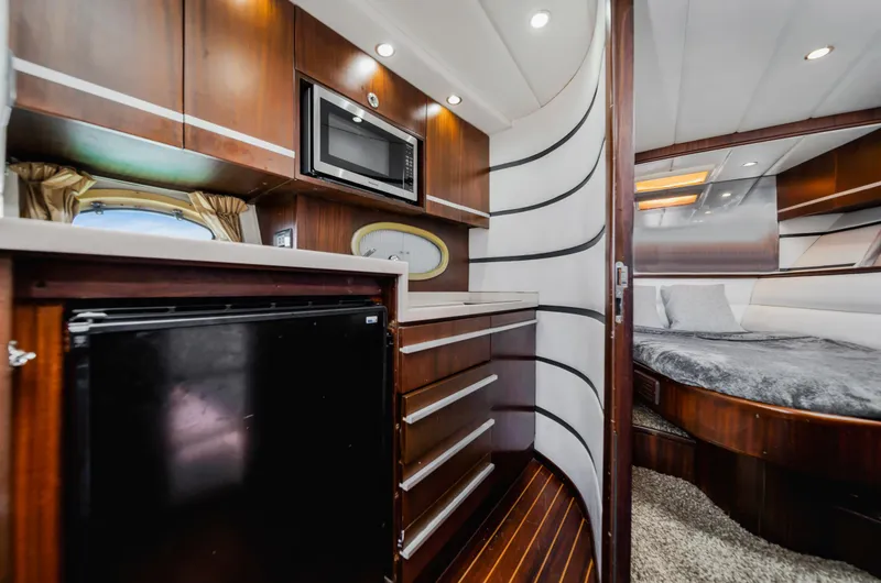 Slide: The Image of Luxurious interior of 2007 Custom NNS Sea Scout 41 yacht with kitchenette and bedroom. - 19