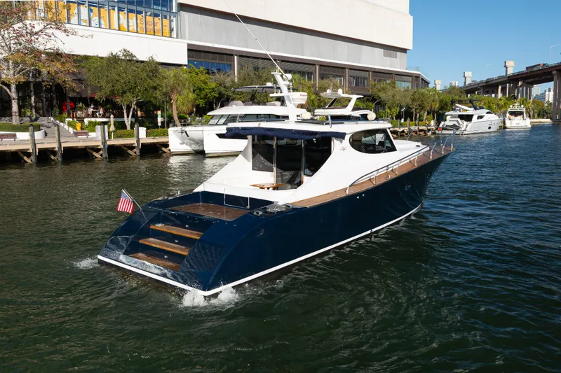Slide: The Image of Custom NNS Sea Scout 41 yacht, 2007 model, cruising in a sunny marina. - 28