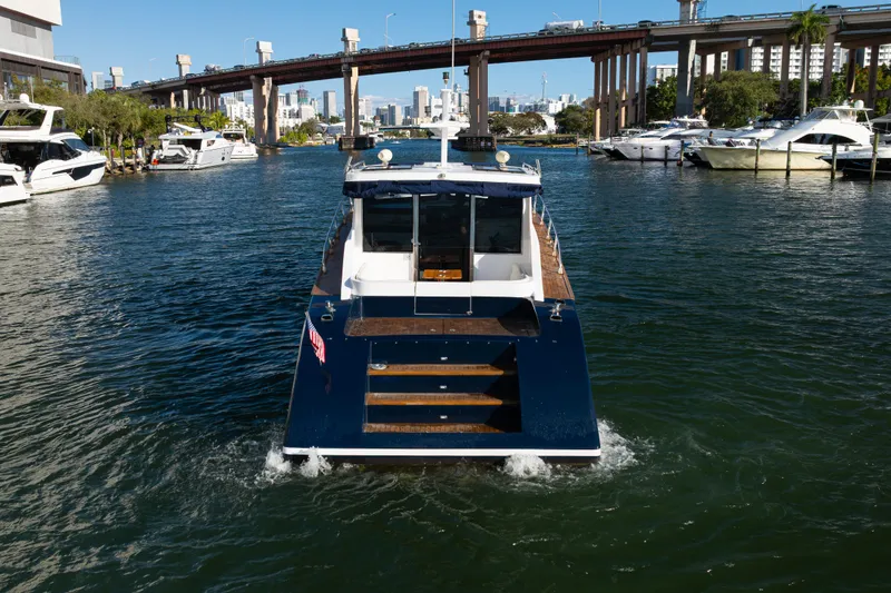 Slide: The Image of Custom NNS Sea Scout 41 yacht cruising in a marina, 2007 model. - 29