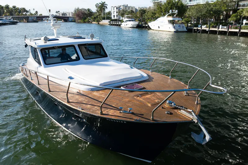 Slide: The Image of Custom NNS Sea Scout 41 boat, 2007 model, cruising on a sunny waterway. - 4