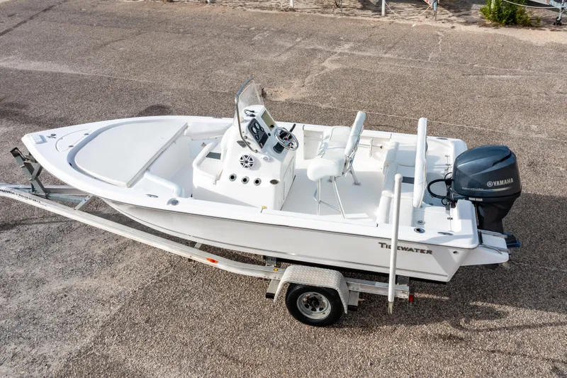 Slide: The Image of 2013 Tidewater 1900 Bay Max boat on trailer with Yamaha outboard motor. - 2