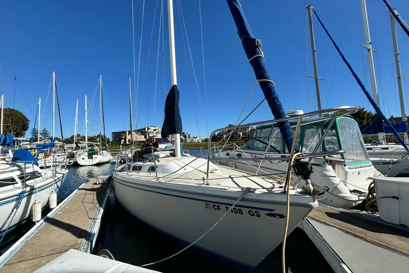 The Image of 1980 Catalina 30 sailboat cruising near Golden Gate Bridge with San Francisco skyline. - 0