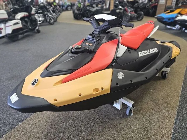 Slide: The Image of 2026 Sea-Doo Spark for 3, red and black, showroom display. - 4