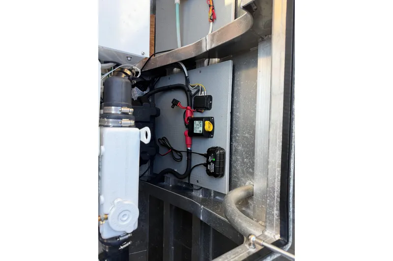 Slide: The Image of Compact bathroom inside 2020 Armstrong Marine 35 boat, featuring toilet, shower, and towel rack. - 102