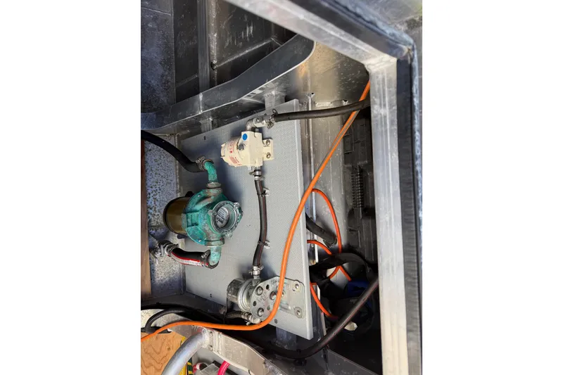 Slide: The Image of Interior of 2020 Armstrong Marine 35 boat with kitchenette and captain's chair. - 103