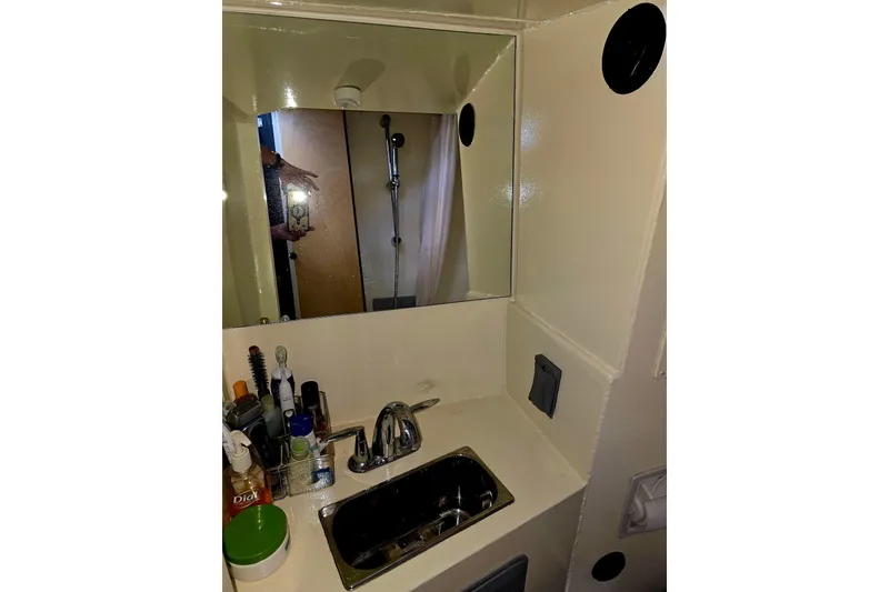 Slide: The Image of Compact bathroom sink area in 2020 Armstrong Marine 35 boat. - 108