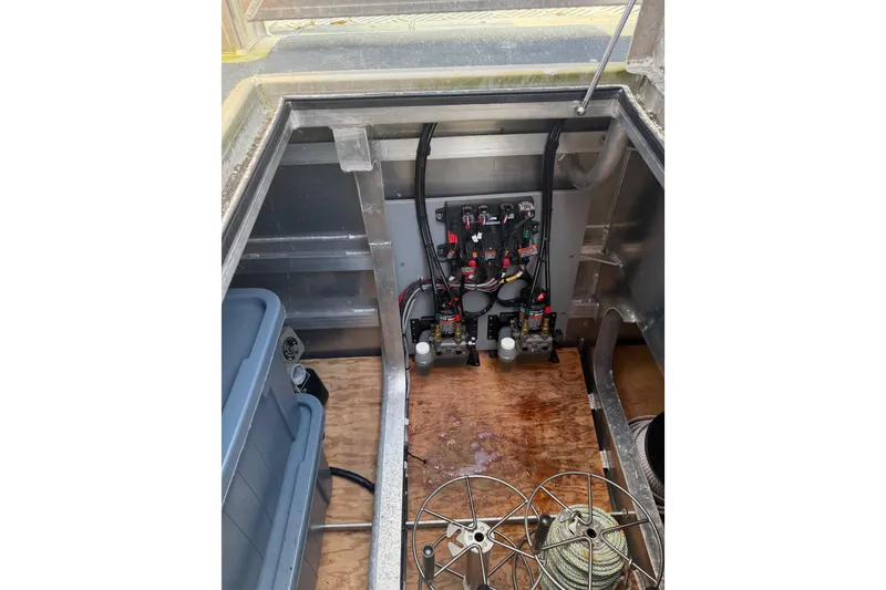 Slide: The Image of Interior view of a 2020 Armstrong Marine 35 boat showing equipment and storage. - 24