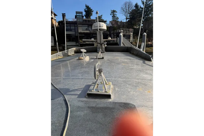 Slide: The Image of Interior view of a 2020 Armstrong Marine 35 boat cockpit with control panel and seating. - 36