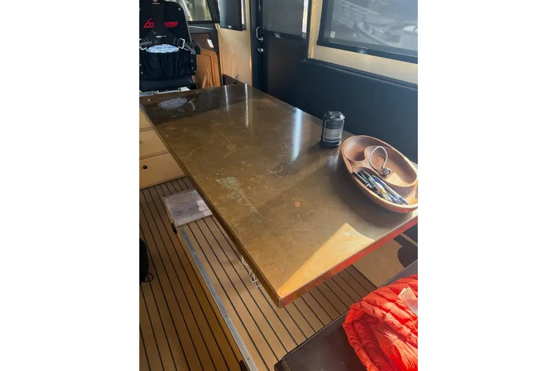 Slide: The Image of Interior of 2020 Armstrong Marine 35 boat with wooden flooring and modern design. - 49