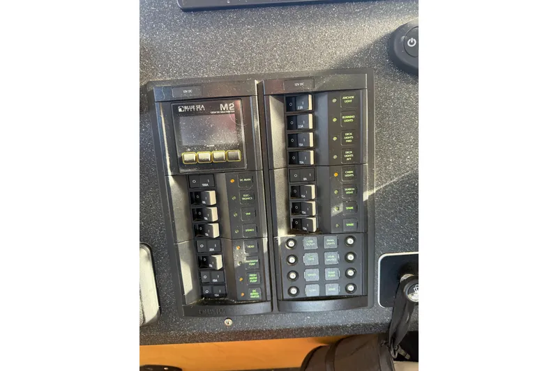 Slide: The Image of Interior of 2020 Armstrong Marine 35 boat with table and seating area. - 77