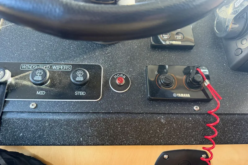 Slide: The Image of Interior of 2020 Armstrong Marine 35 with wooden drawers and seating. - 80