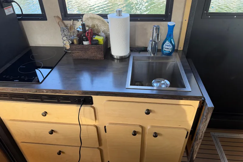 Slide: The Image of 2020 Armstrong Marine 35 boat deck with railing and equipment. - 85