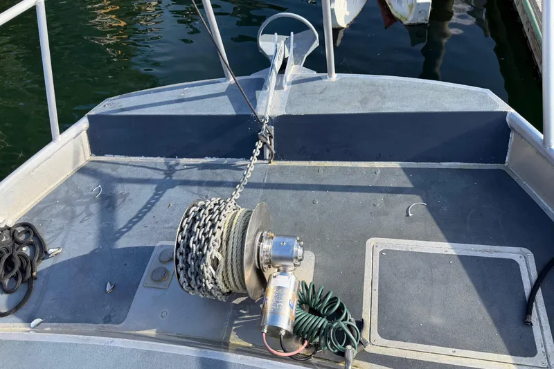 Slide: The Image of Interior view of a 2020 Armstrong Marine 35 boat, featuring storage and safety equipment. - 94