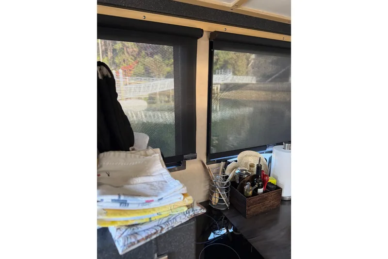 Slide: The Image of Engine compartment of a 2020 Armstrong Marine 35, showing mechanical components and wiring. - 97