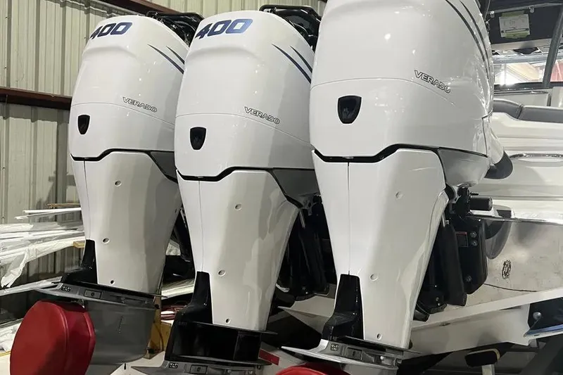 Slide: The Image of Triple Mercury Verado 400 outboard engines on a 2023 Nor-Tech 340 Sport Open Center Console. - 19