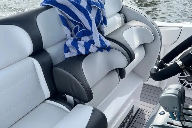 Slide: The Image of 2023 Nor-Tech 340 Sport Open Center Console with triple Mercury 400 engines on water. - 5