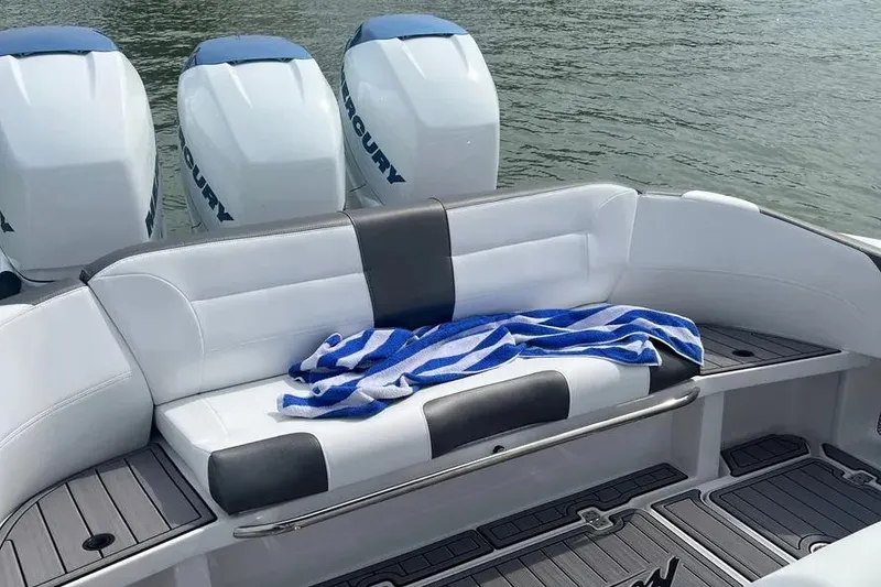 Slide: The Image of Dashboard of 2023 Nor-Tech 340 Sport Open Center Console with navigation and engine data displays. - 9