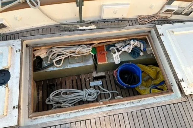 Slide: The Image of Storage compartment on 1981 Grand Banks 36 Classic boat with ropes and equipment. - 22