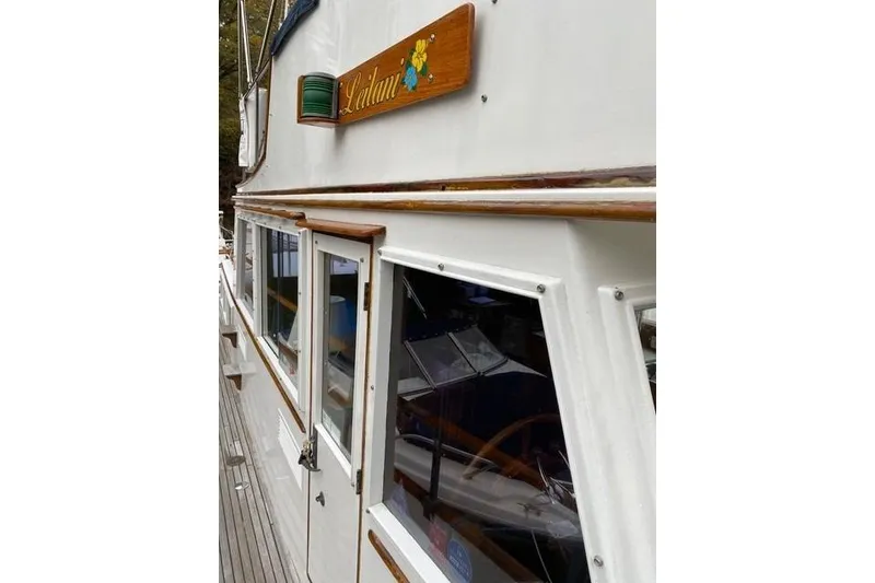 Slide: The Image of 1981 Grand Banks 36 Classic boat with wooden details and nameplate "Leilani." - 9