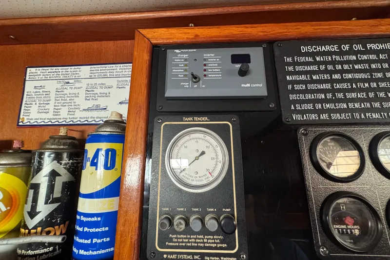 Slide: The Image of Interior of a 1978 Robert Perry 47 yacht with wooden furnishings and cozy seating. - 27