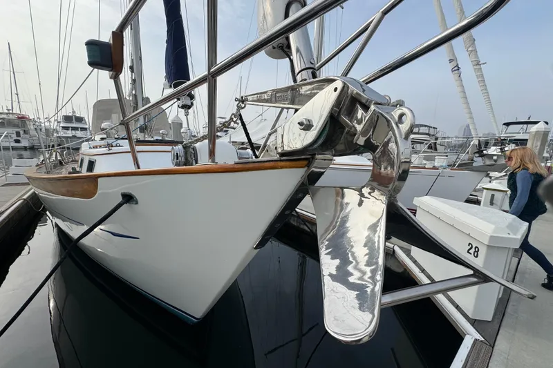 Slide: The Image of Sailboat docked at marina, Robert Perry 47 model, 1978, overcast sky. - 3