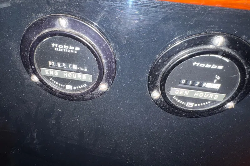 Slide: The Image of Storage area on a 1978 Robert Perry 47 boat, filled with tools and equipment. - 30