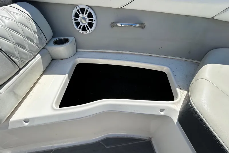 Slide: The Image of Interior of 2022 Regal LS2 boat with seating and speaker. - 115