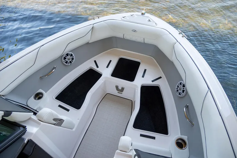 Slide: The Image of Manufacturer Provided Image: 2022 Regal LS2 boat interior with cushioned seating and storage compartments. - 12