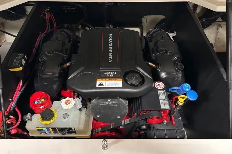 Slide: The Image of 2022 Regal LS2 boat engine compartment with Volvo Penta 280 V6 engine. - 20
