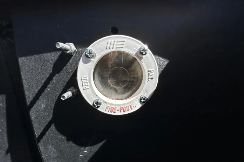 Slide: The Image of Close-up of a Regal LS2 2022 engine component with visible screws and labels. - 59