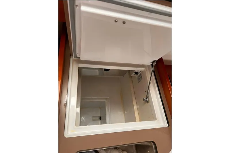 Slide: The Image of Open storage compartment on 2017 Beneteau Oceanis 38.1 sailboat. - 21
