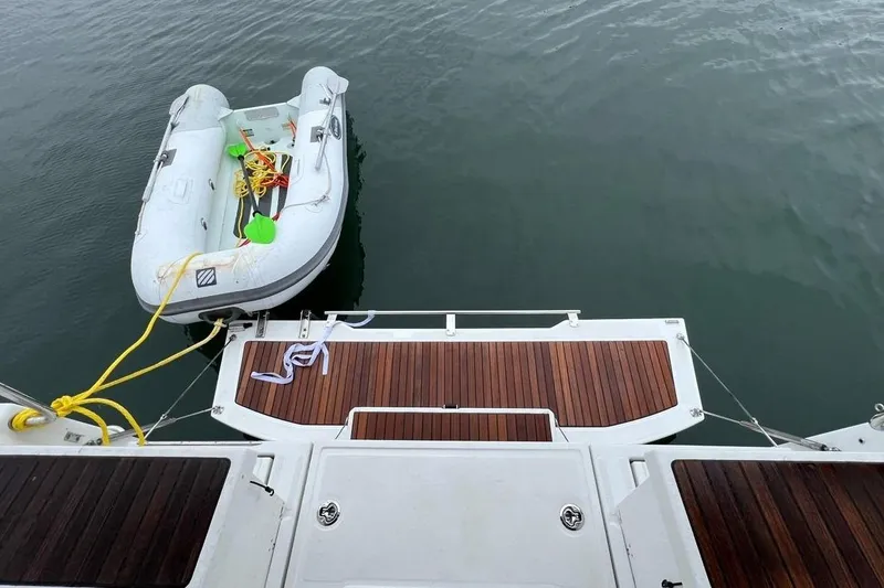 Slide: The Image of Beneteau Oceanis 38.1 yacht with dinghy, 2017 model. - 37