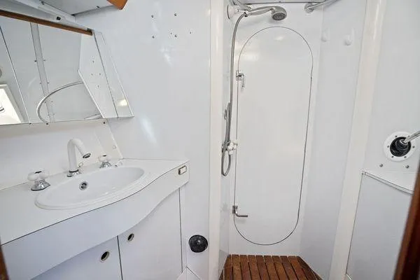Slide: The Image of Bathroom interior of 1989 Wauquiez Centurion 47 yacht with shower and sink. - 12