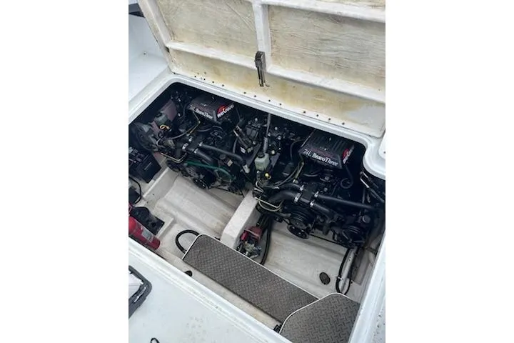 Slide: The Image of Engine compartment of a 1995 Formula 31 Performance Cruiser, showcasing dual engines. - 10