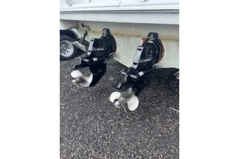 Slide: The Image of 1995 Formula 31 Performance Cruiser with dual propellers on gravel surface. - 14