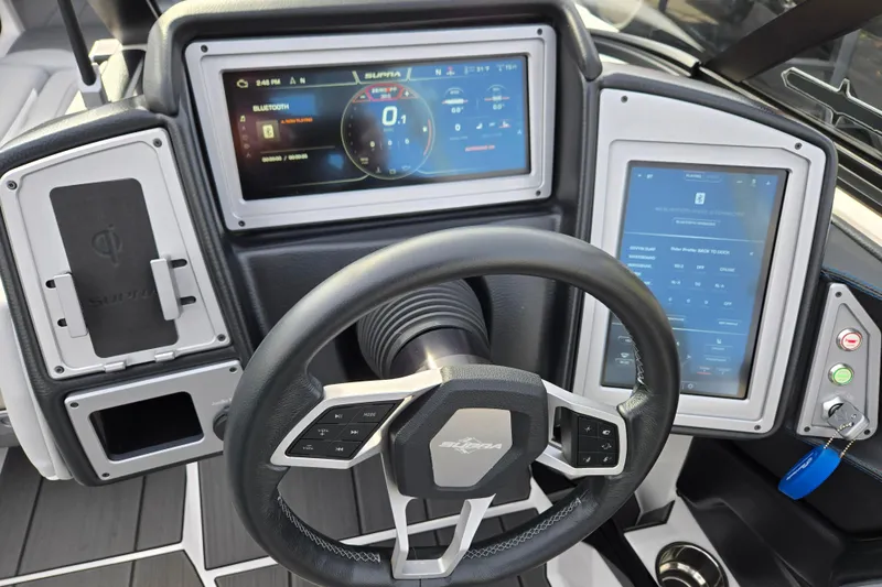 Slide: The Image of 2023 Supra SL 450 dashboard with advanced digital displays and steering wheel controls. - 19