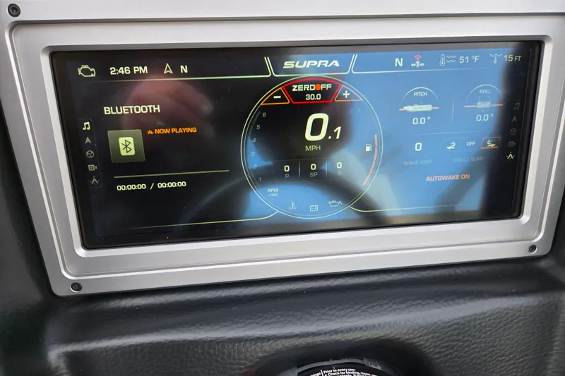 Slide: The Image of 2023 Supra SL 450 dashboard display with Bluetooth and navigation features. - 21