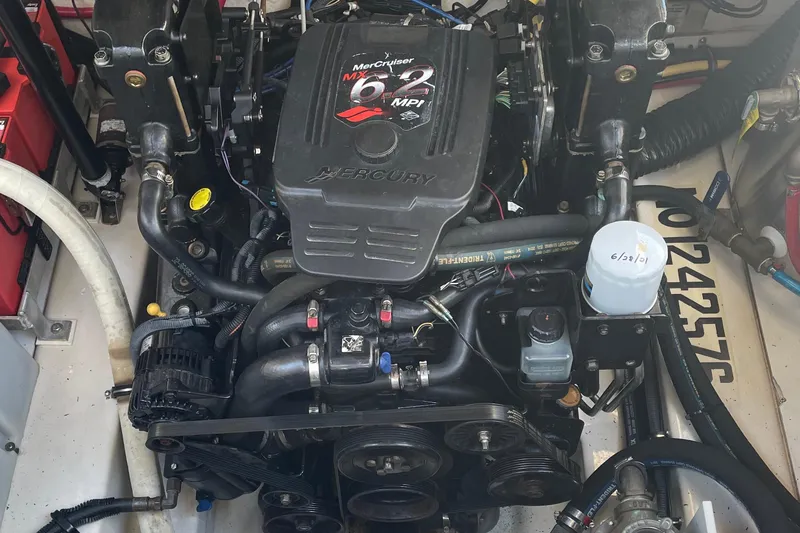Slide: The Image of Engine of a 2006 Sea Ray Sundancer 260 boat, featuring a MerCruiser 6.2 MPI. - 1