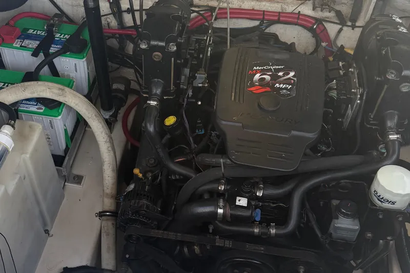 Slide: The Image of Engine compartment of a 2006 Sea Ray Sundancer 260 with MerCruiser 6.2 MPI engine. - 2