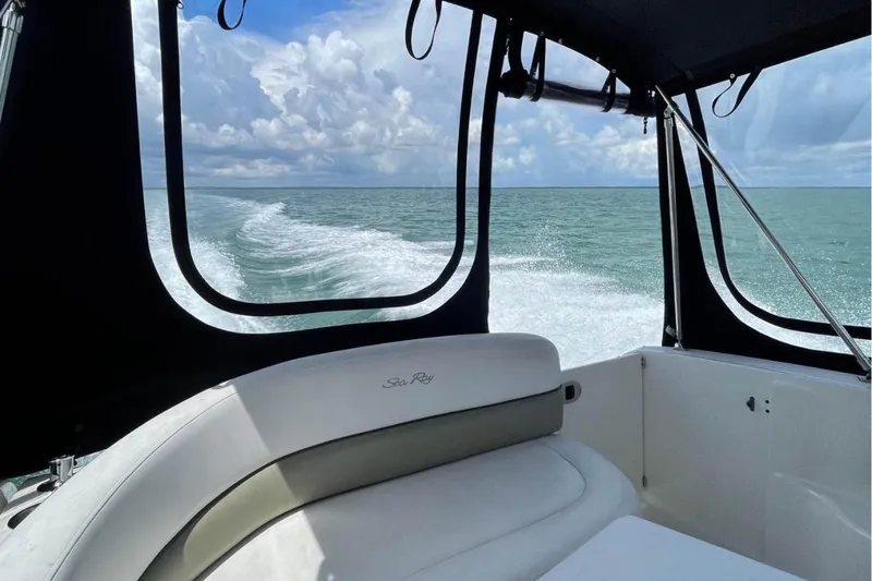 Slide: The Image of 2006 Sea Ray Sundancer 260 interior with ocean view through windows. - 7