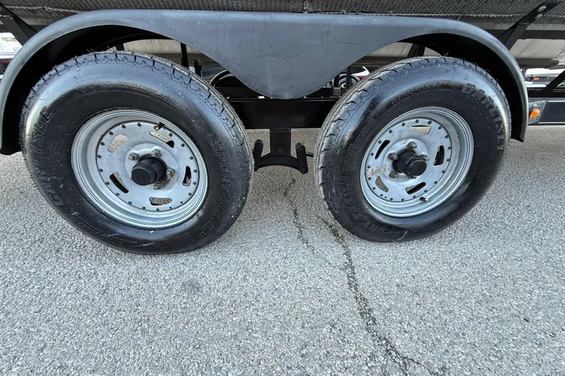Slide: The Image of Trailer wheels of a 2014 Veranda Fishing V2075-F2 on asphalt surface. - 19