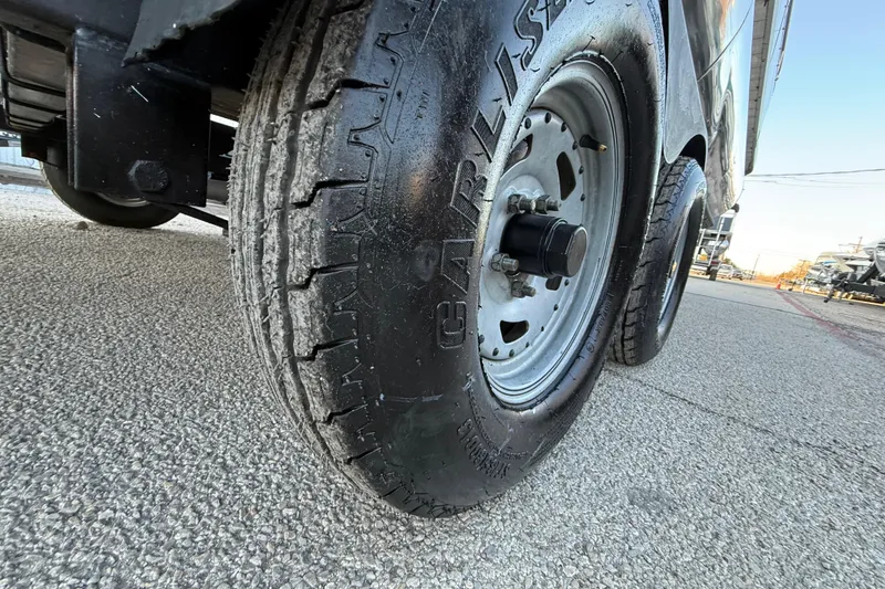 Slide: The Image of Close-up of a 2014 Veranda Fishing V2075-F2 trailer tire on asphalt. - 21